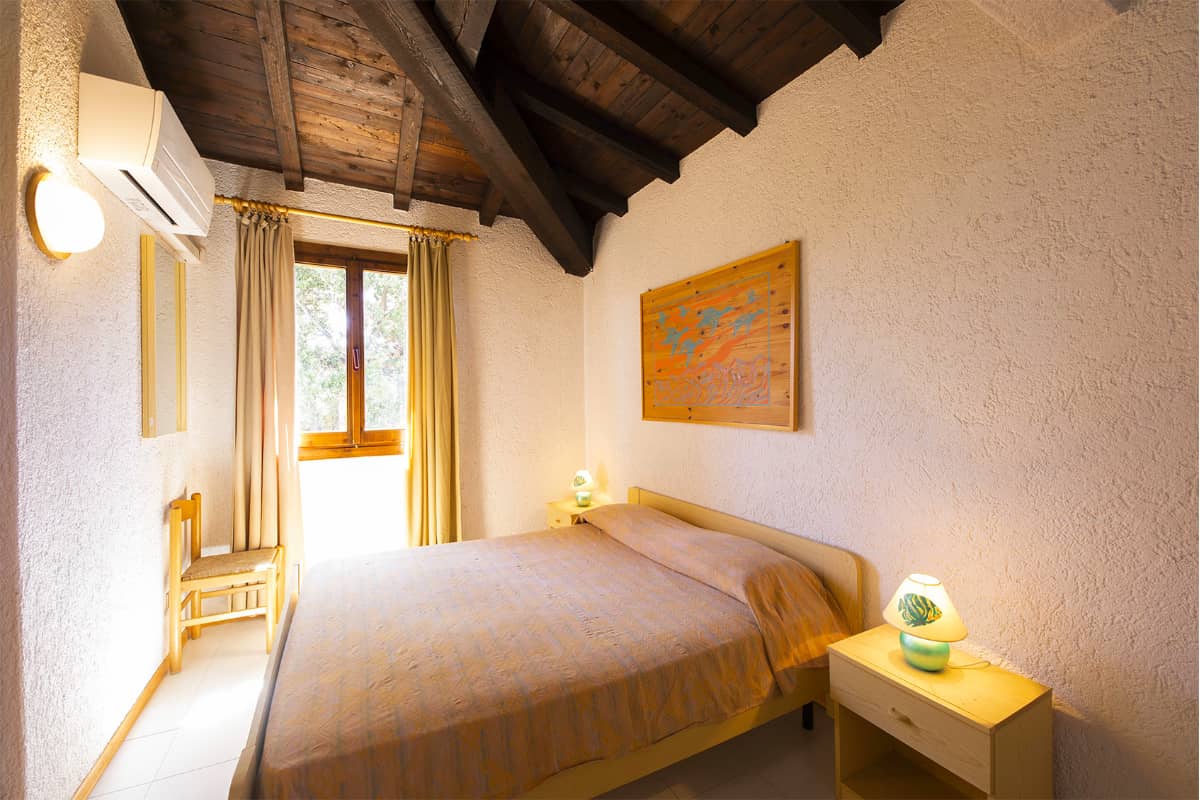 Trilocale Portorotondo Residence letto